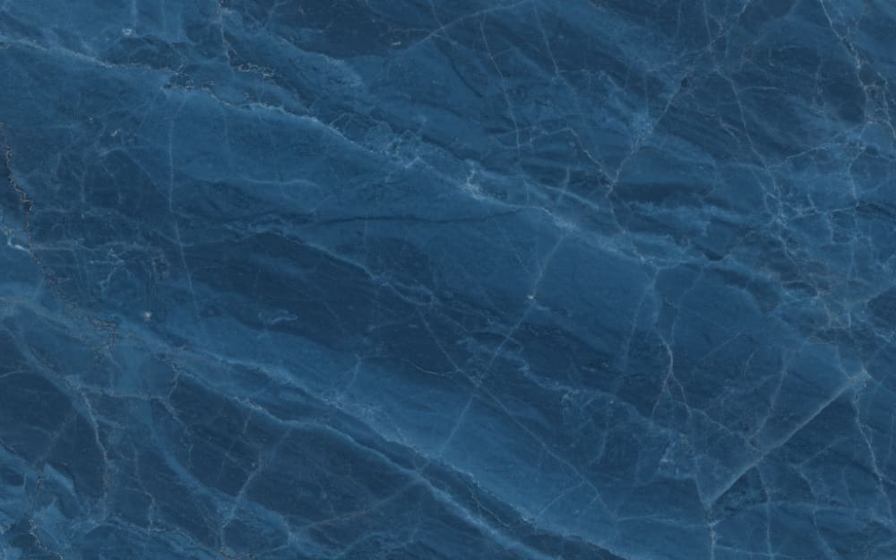 Shadow Blue Marble marble — polished slab surface showing Blue coloring. Origin: Brazil. Hardness: 3 Mohs. Acid sensitivity: high.