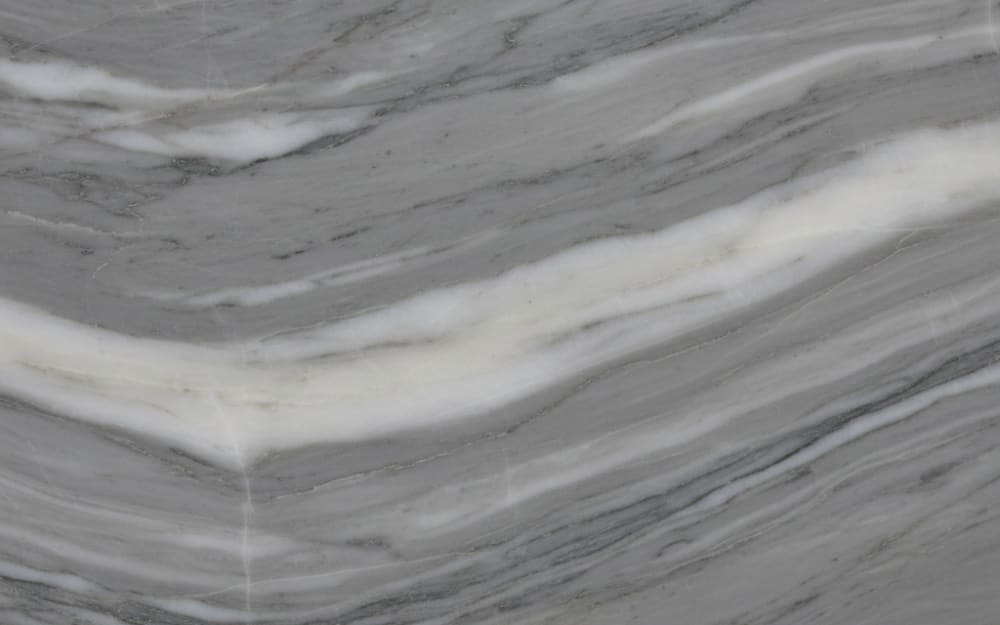 Silver Wave marble — polished slab surface showing Grey coloring. Origin: Turkey. Hardness: 3 Mohs. Acid sensitivity: high.
