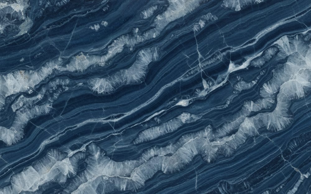 Skyfall quartzite — polished slab surface showing Grey coloring. Origin: Brazil. Hardness: 7 Mohs. Acid sensitivity: low.