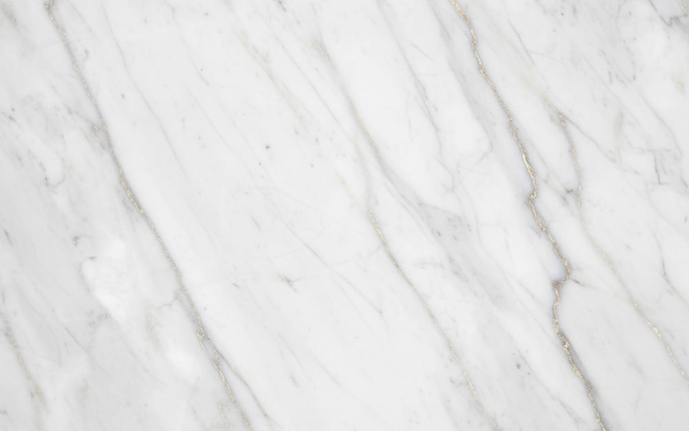 Valentino Marble marble — polished slab surface showing White coloring. Origin: Italy / Turkey. Hardness: 3 Mohs. Acid sensitivity: high.