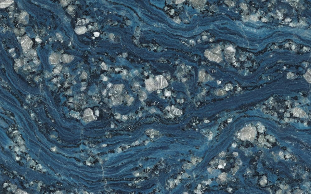 Verde Labrador granite — polished slab surface showing Blue coloring. Origin: Norway. Hardness: 6 Mohs. Acid sensitivity: none.