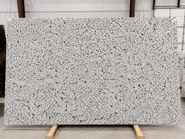 Bianco Crystal granite polished slab surface texture — White tones, quarried from India