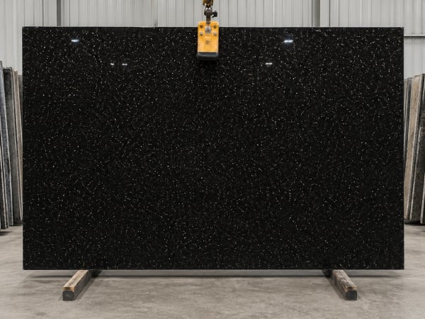 Black Galaxy granite polished slab surface texture — Black tones, quarried from India (Andhra Pradesh — W. Godavari district)
