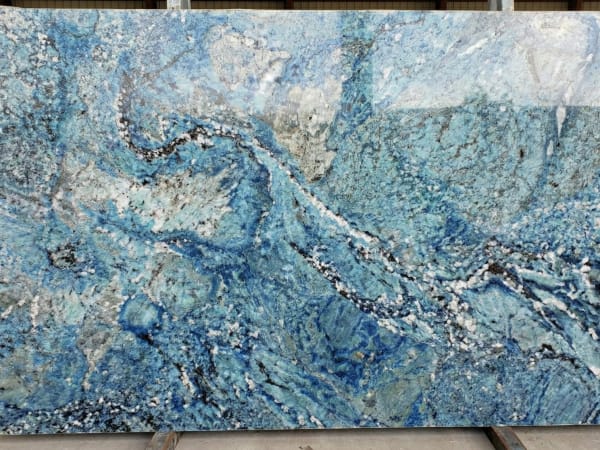 Caribbean Blue granite polished slab surface texture — Blue tones, quarried from Brazil