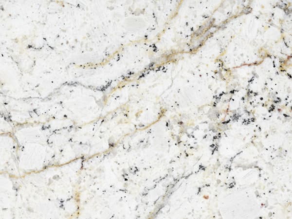 Juparana Delicatus granite polished slab surface texture — White tones, quarried from Brazil