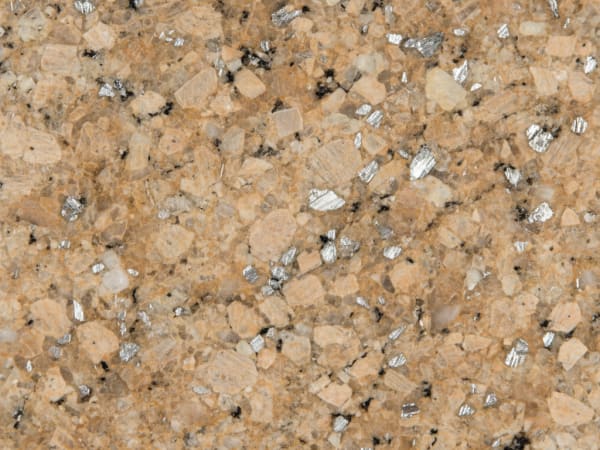 Leathered Titanium granite polished slab surface texture — Tan/Beige tones, quarried from Brazil