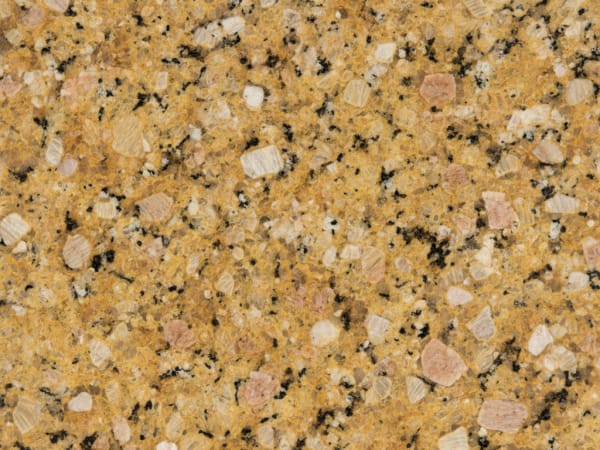 Vienna Gold granite polished slab surface texture — Gold/Yellow tones, quarried from Brazil