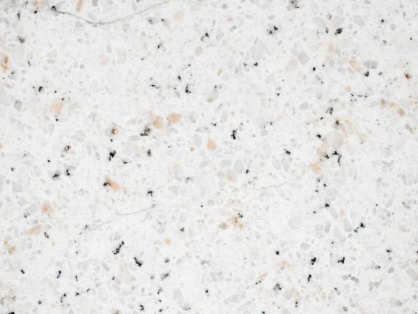 White Ornamental granite polished slab surface texture — White tones, quarried from Brazil