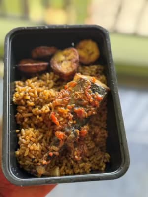 Jollofrice with peppered fish