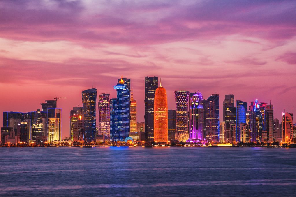 doha-swiftly-matures-forward-of-globe-mug-2022