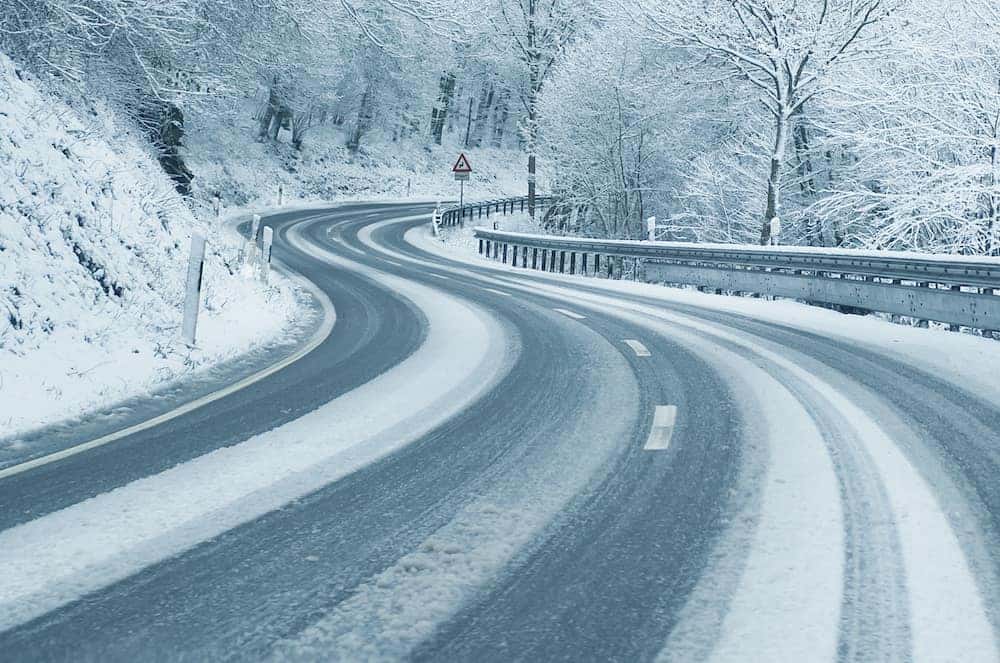 snowy mountain road winter driving