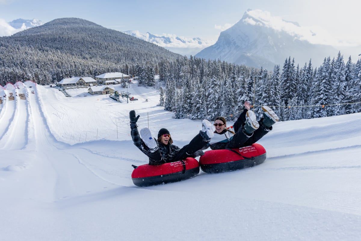family snow tubing at Mt Norquay Banff winter