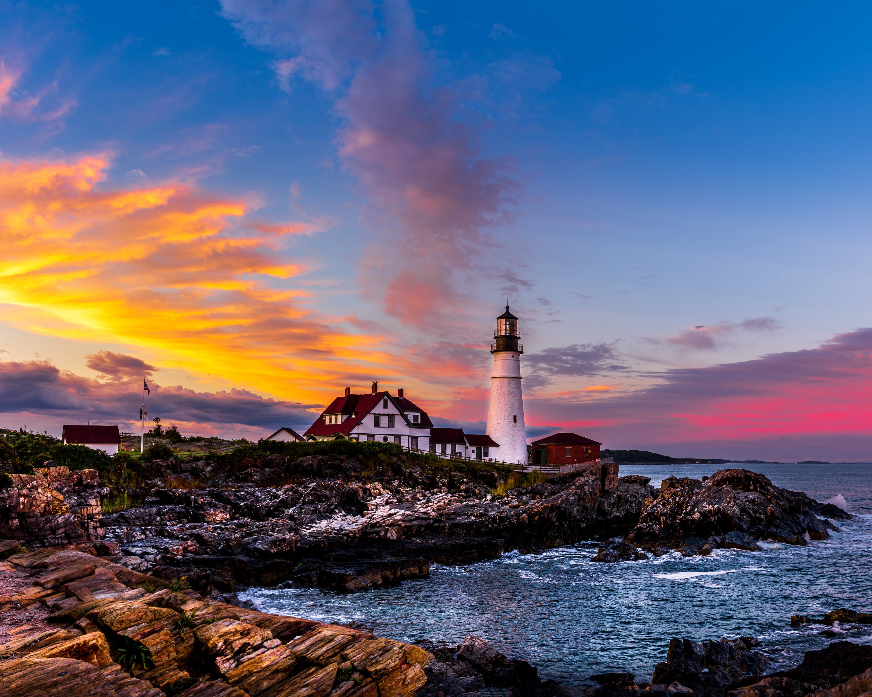 Maine lighthouse sunset coastal Maine