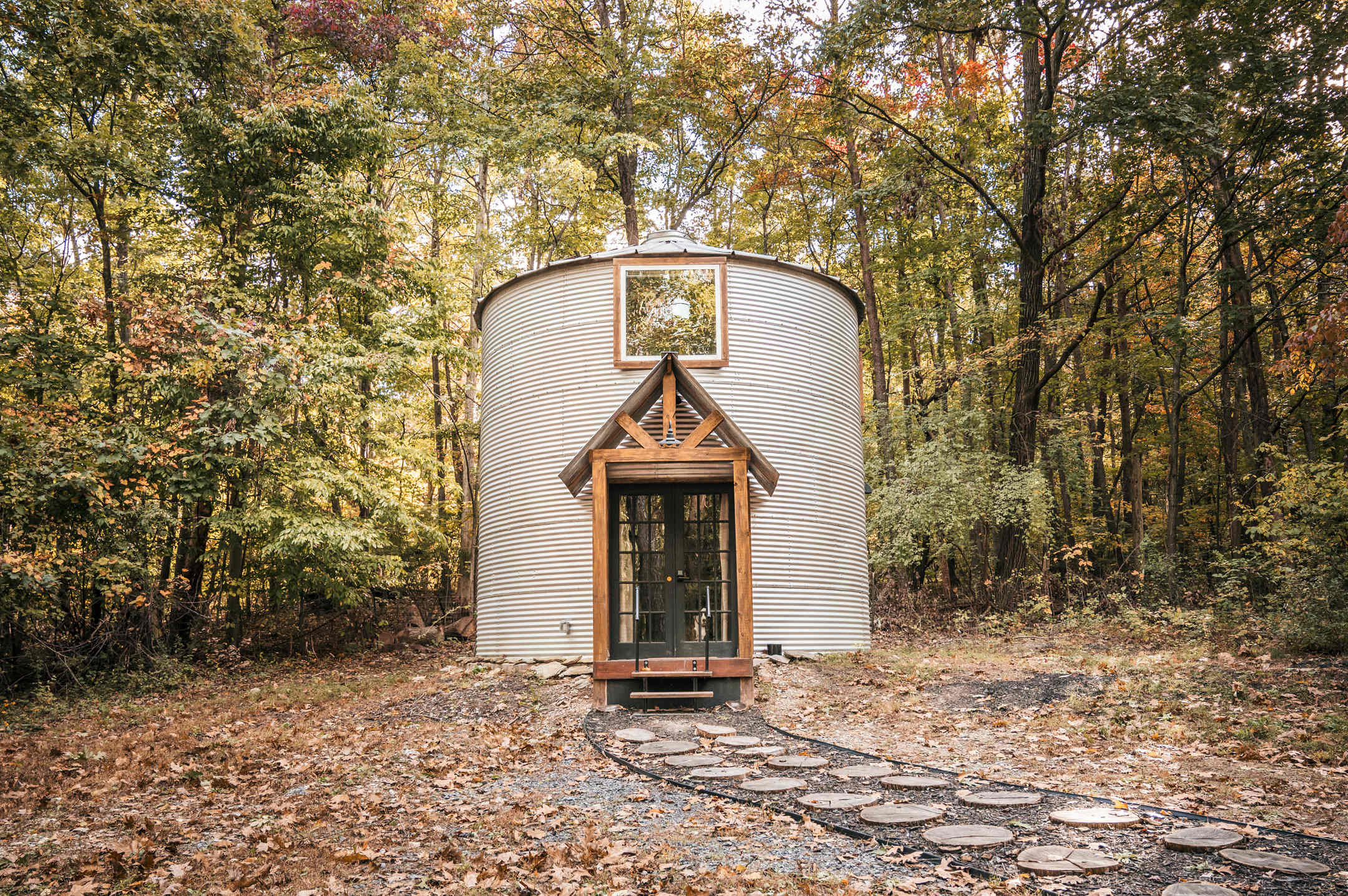 converted silo house countryside autumn