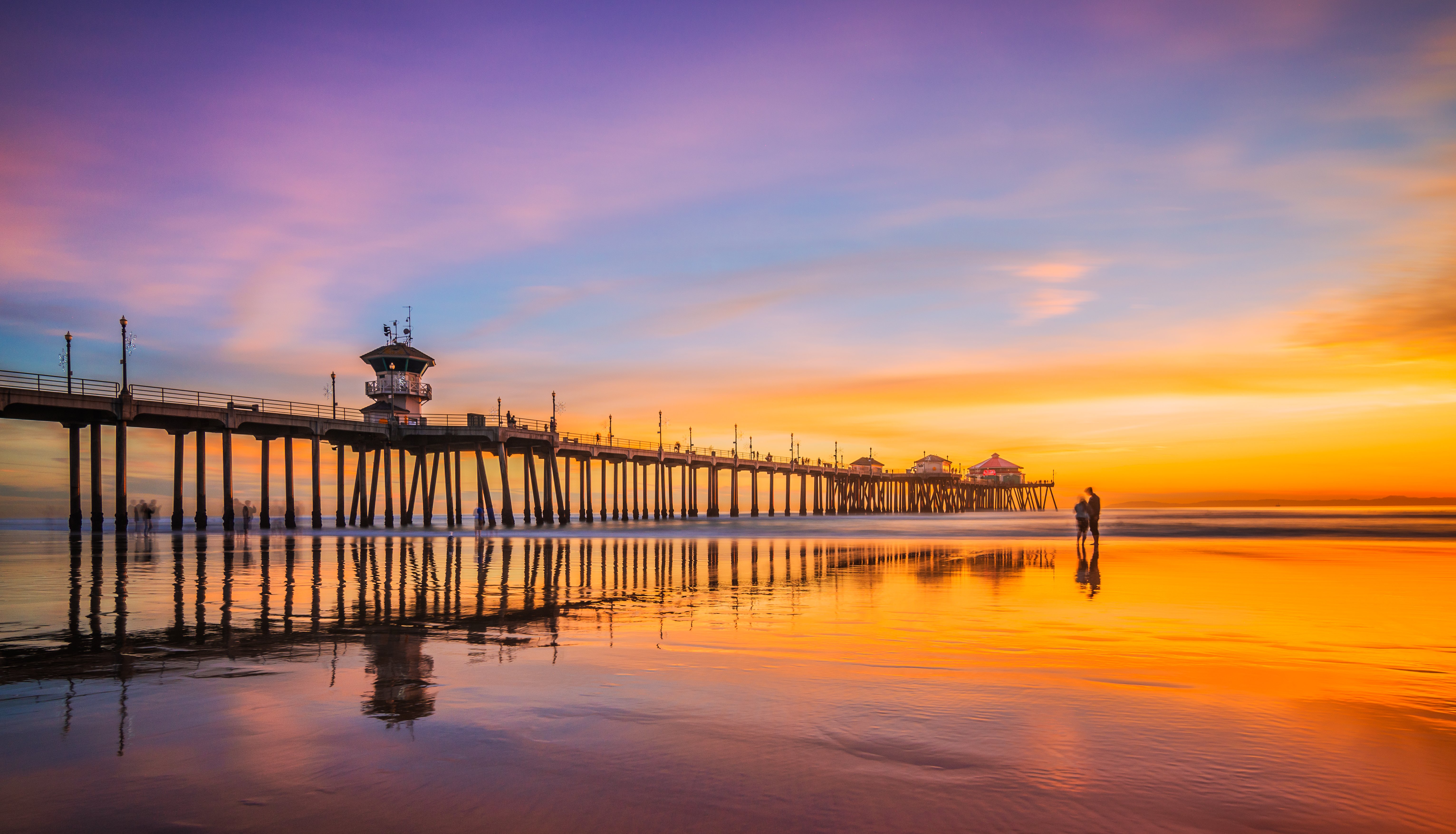 Huntington Beach surfing pier sunset