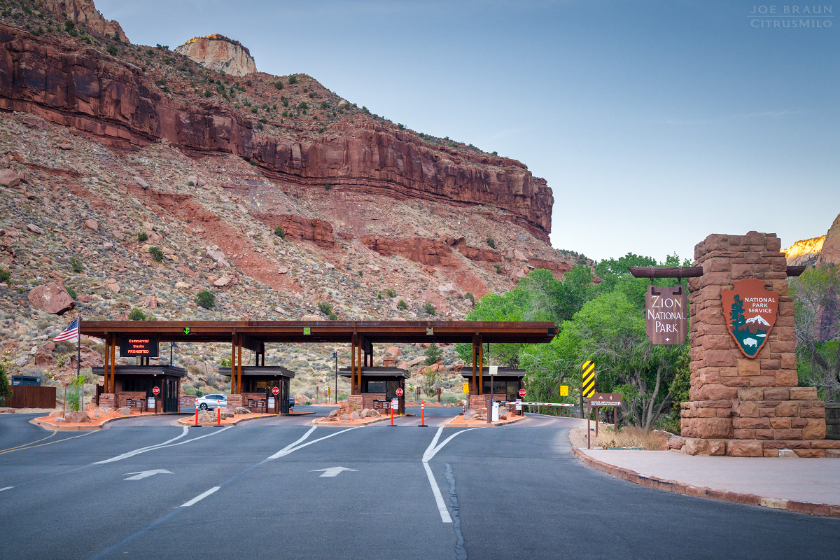 national park entrance fee station sign