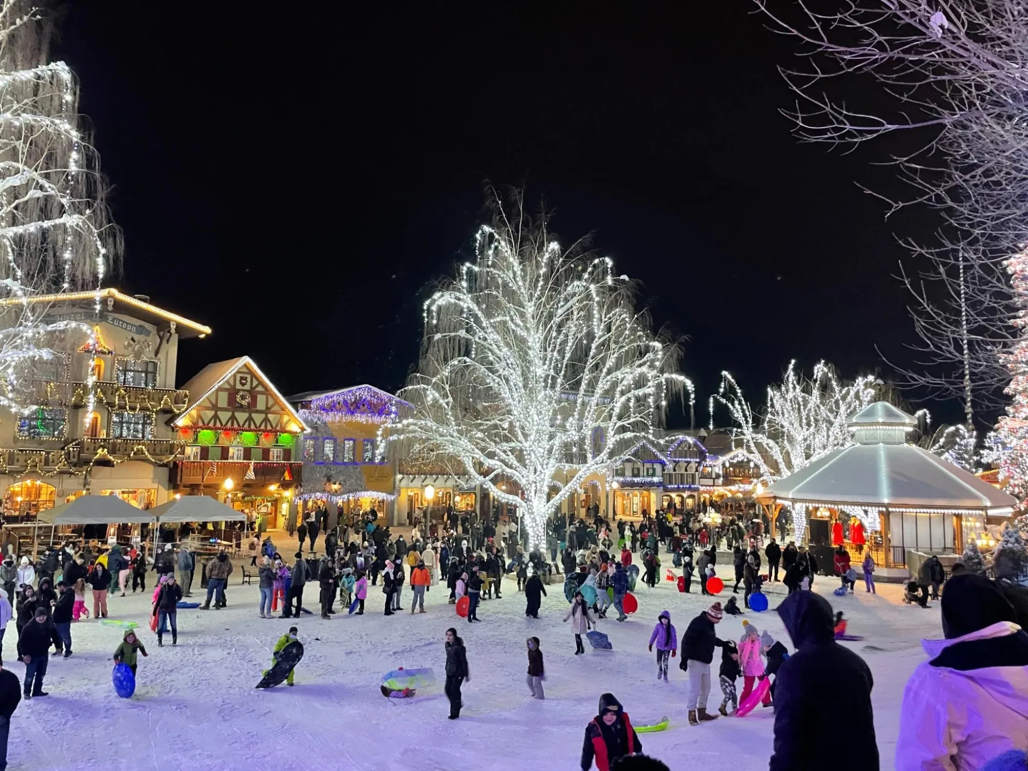 Leavenworth Bavarian village Christmas lights snow nighttime