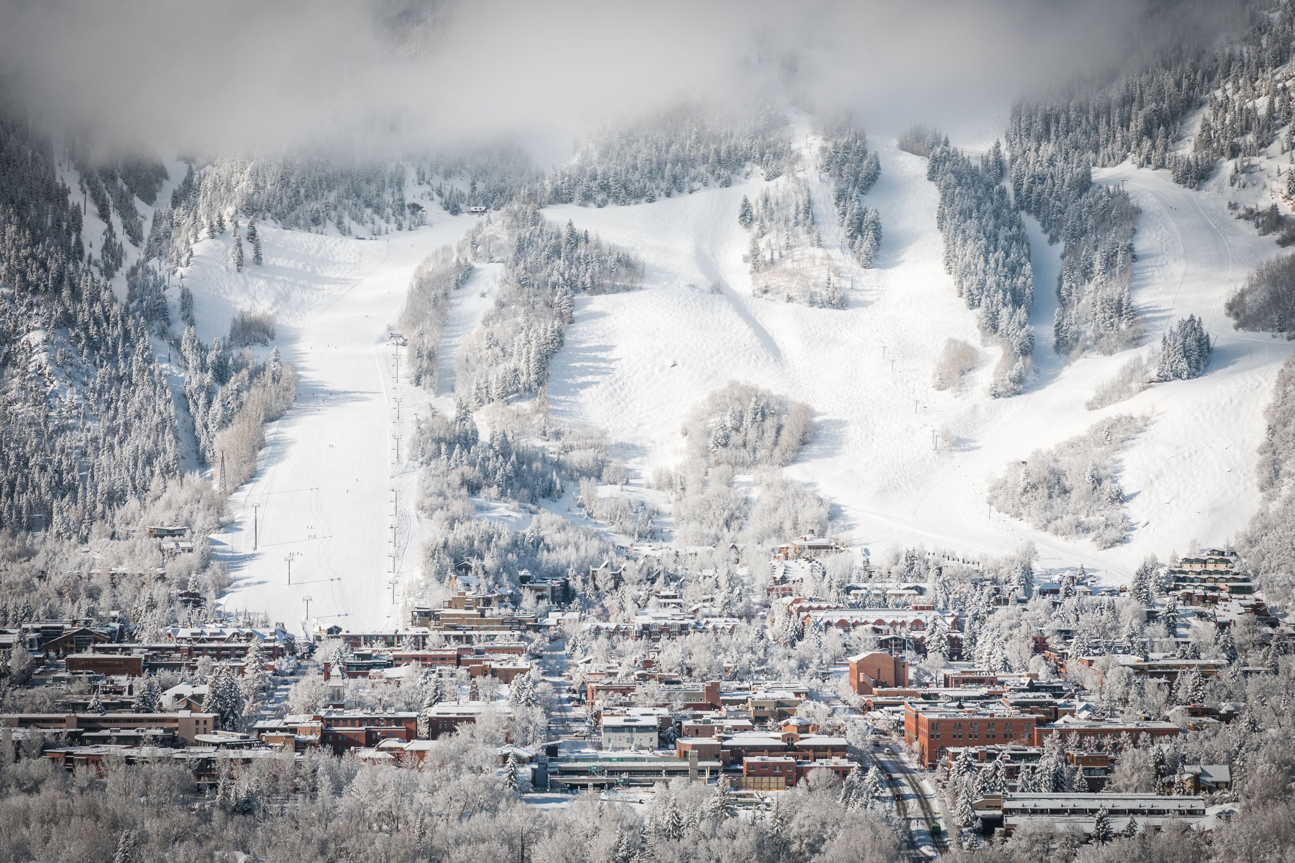 Colorado mountain ski town winter aerial view