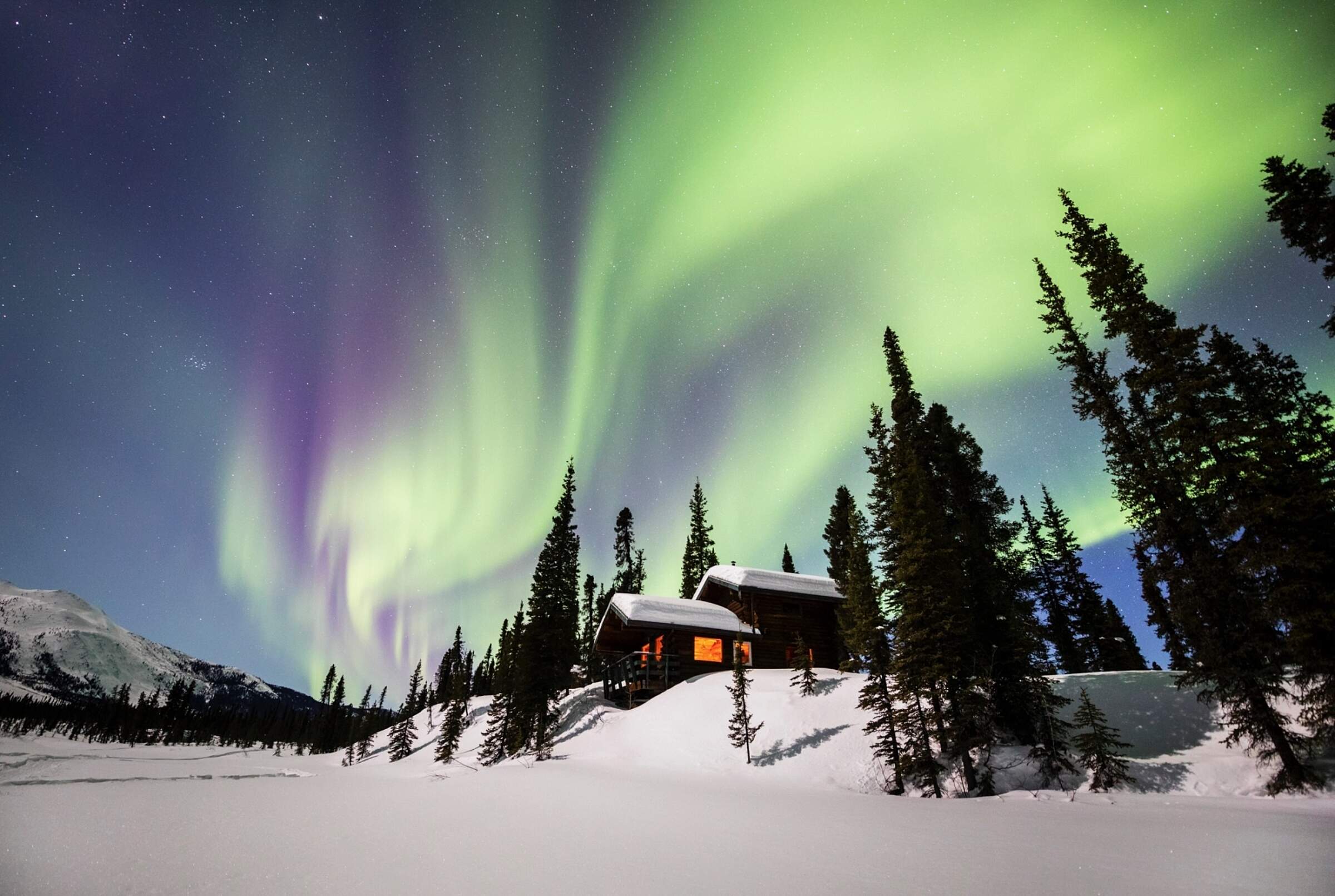 Alaska northern lights winter cabin