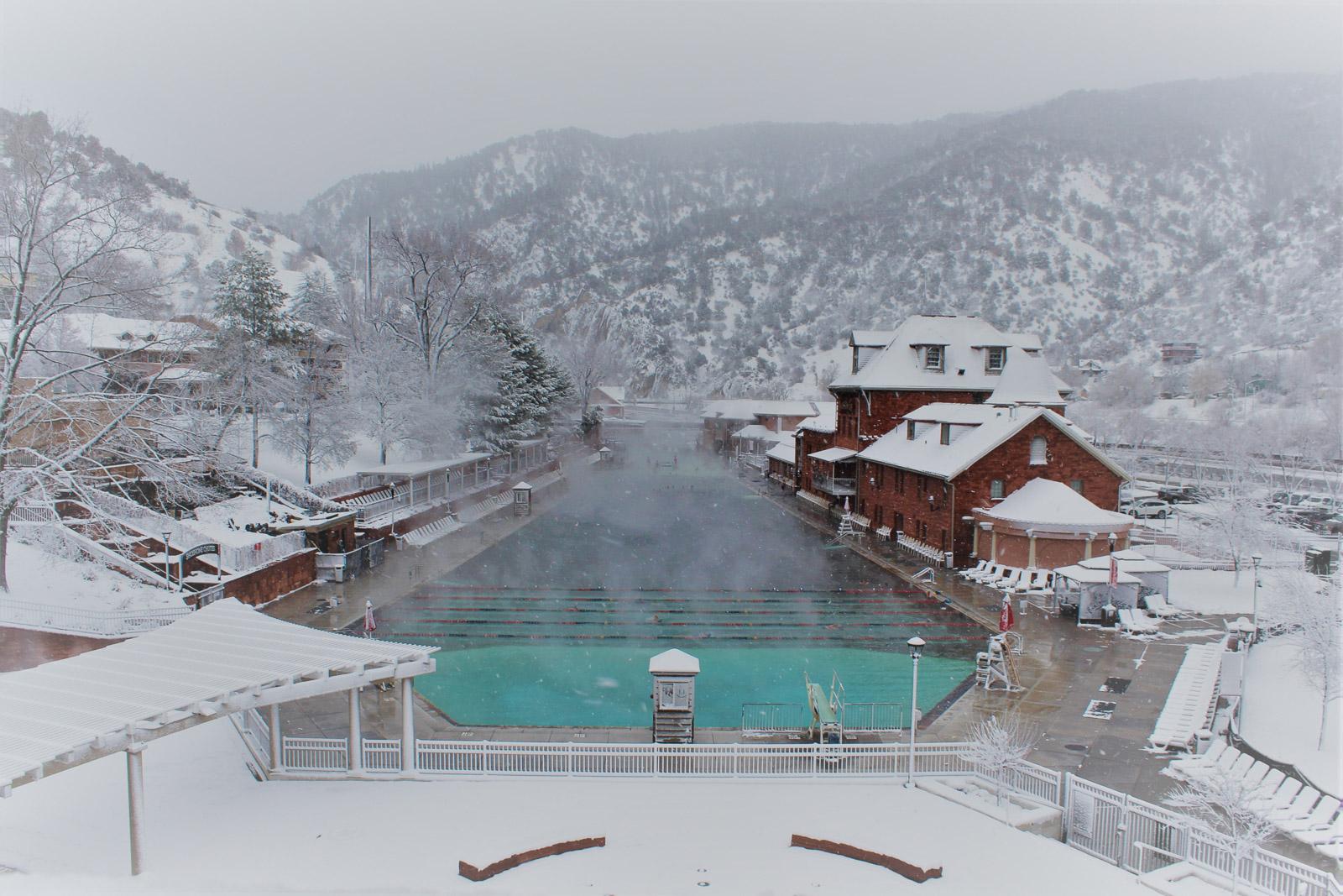 steamy winter hot springs pool snow