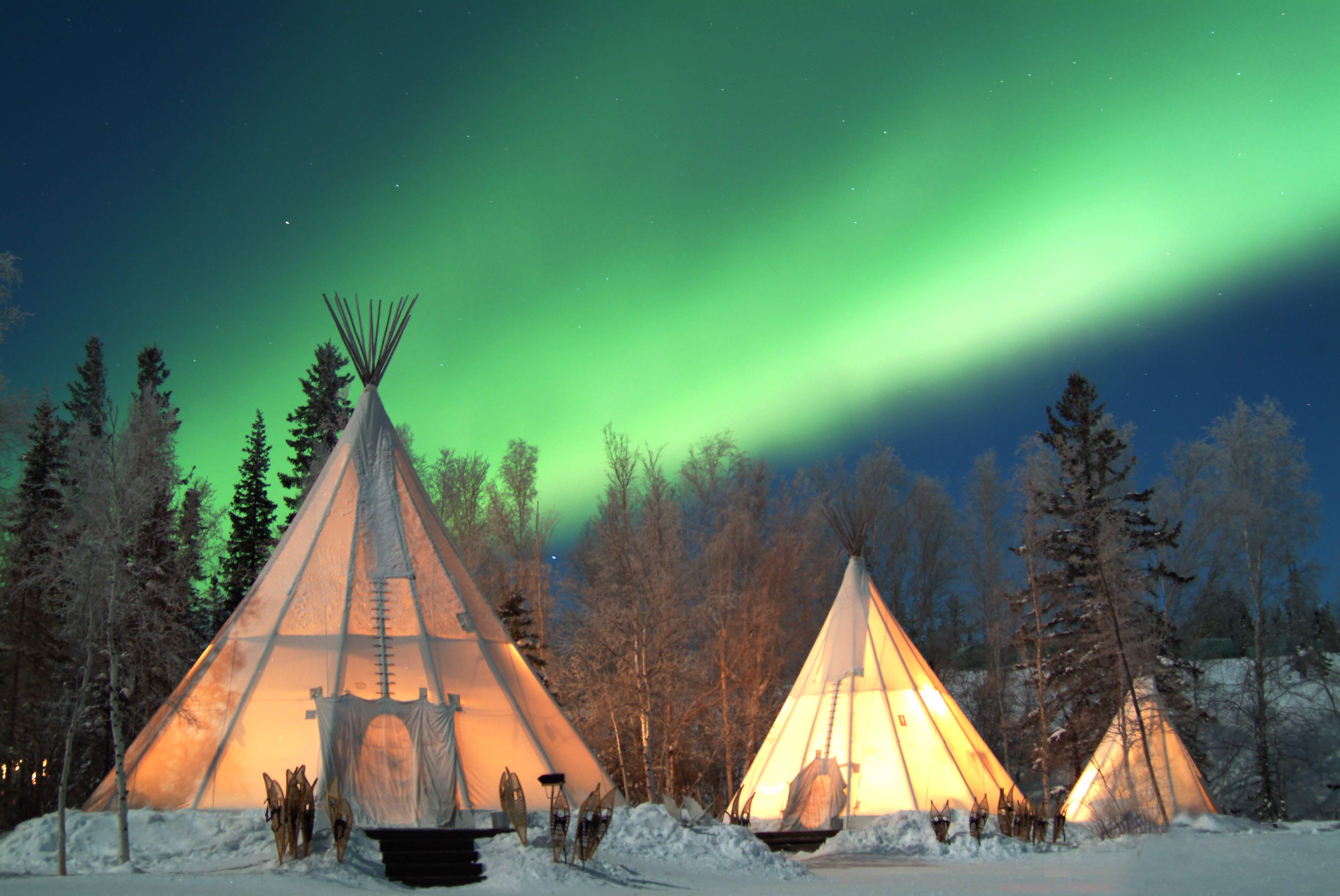 Yellowknife Canada aurora village winter teepees