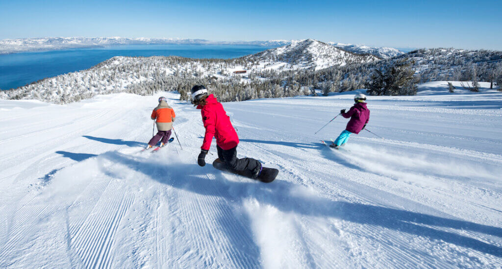 Lake Tahoe winter snow mountains blue water