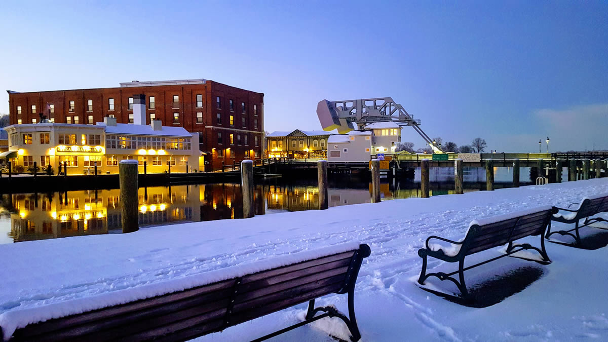 Mystic Connecticut winter harbor boats snow maritime village
