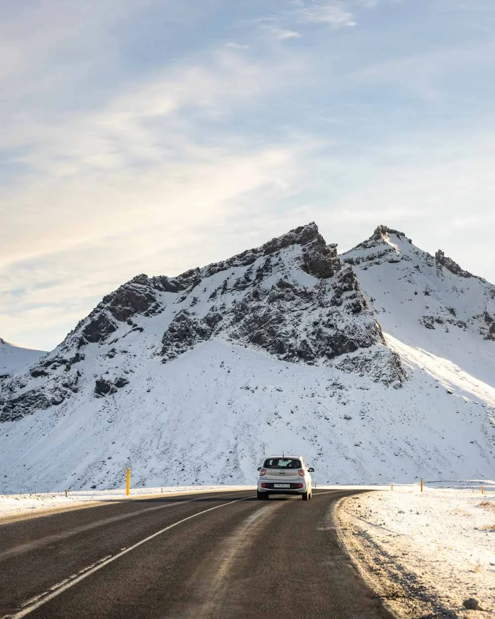 iceland winter road snow mountains driving