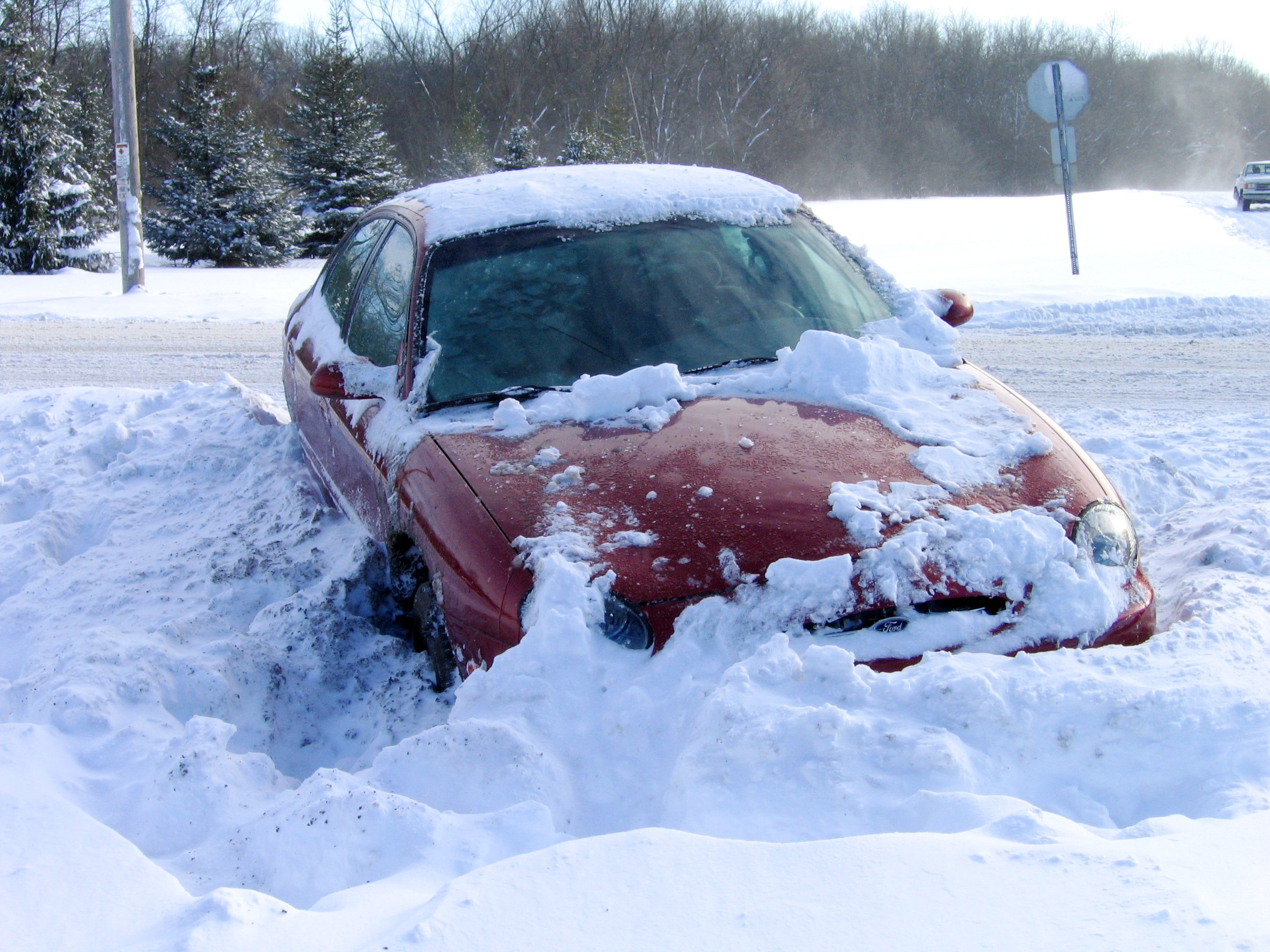 car stuck in snow iceland winter road