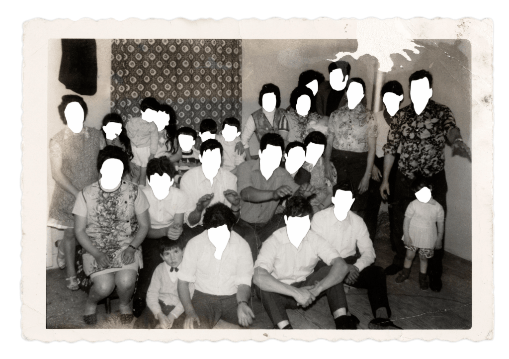 Group photo at a party, every face blanked out in white.