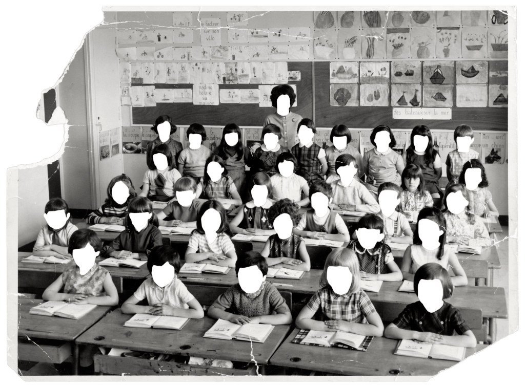 Class photo, every child's face blanked out in white.