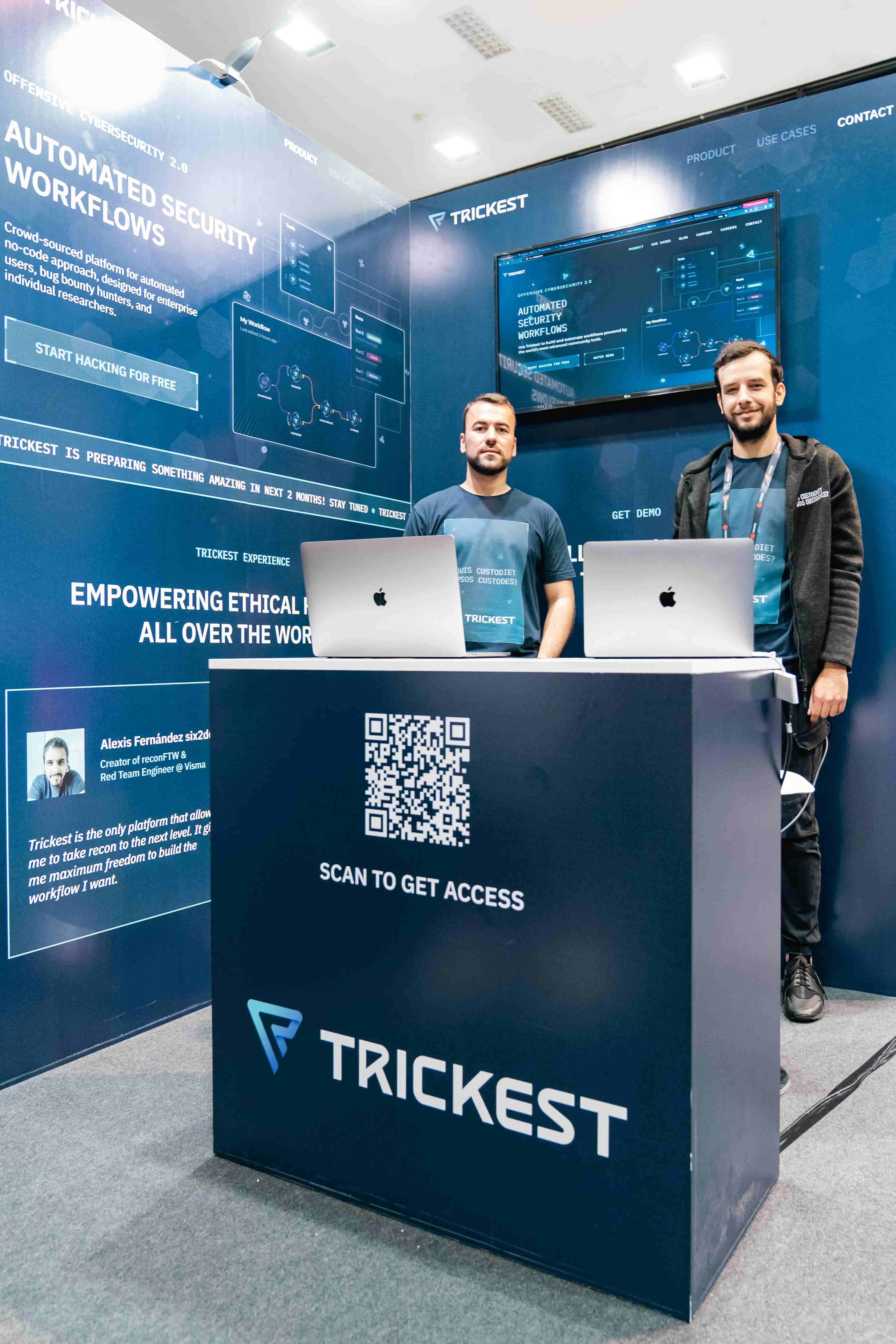 Trickest crew standing at the booth at Infobip Shift 2022 in Zadar