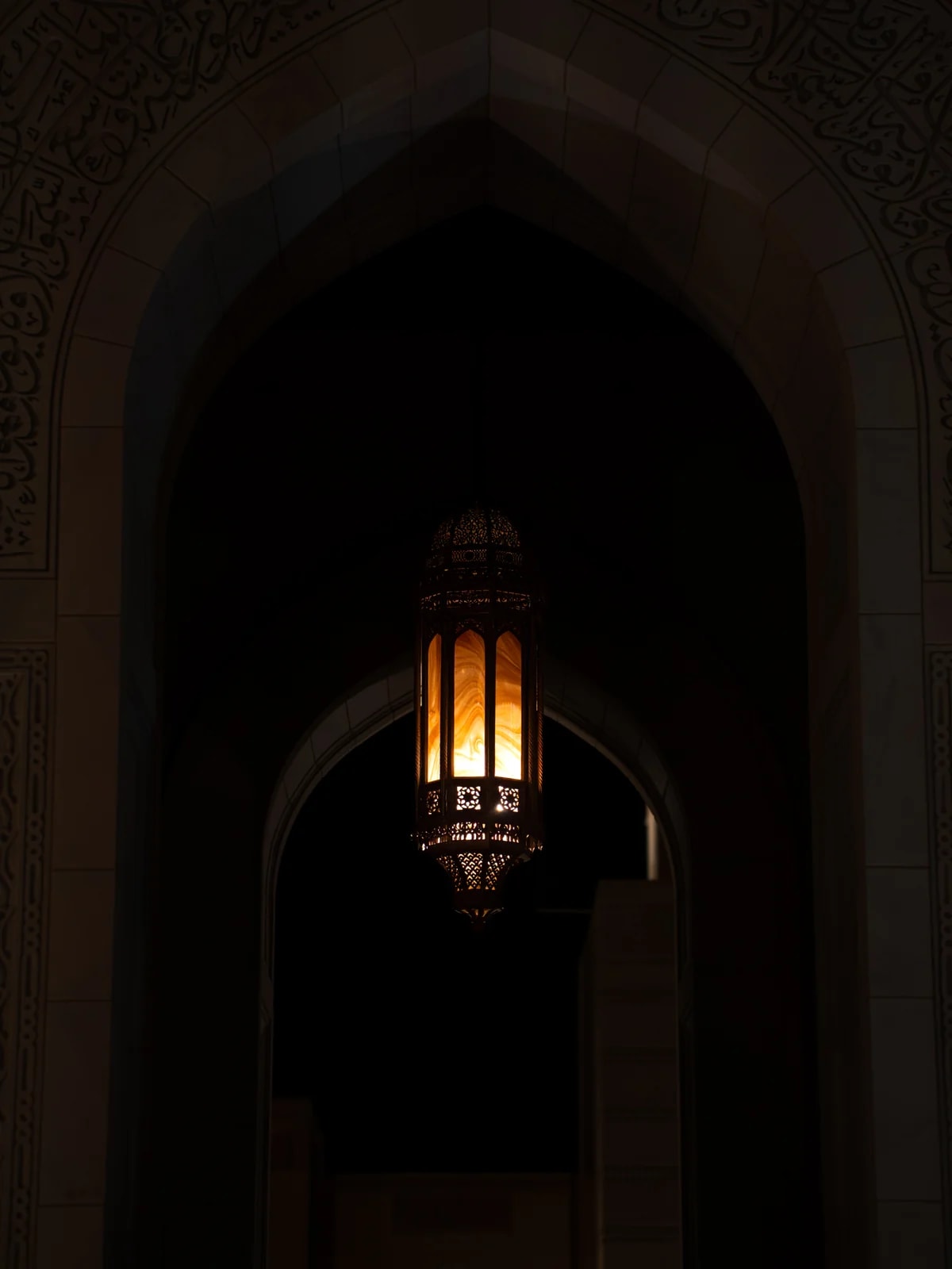 Glowing mosque lamp detail