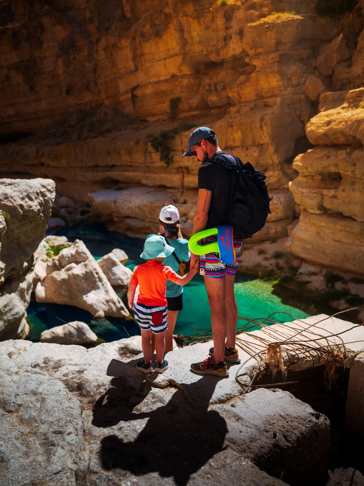 Father with child at Wadi Shab
