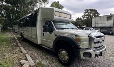 Premium 2013 Ford F-550 28-Passenger Diesel Shuttle Bus