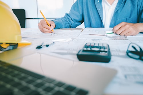 Financial analyst managing payroll ledgers and multi-currency transactions