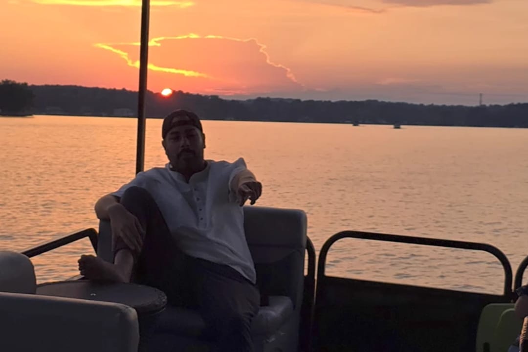 Guest enjoying a sunset cruise on Lake Wylie