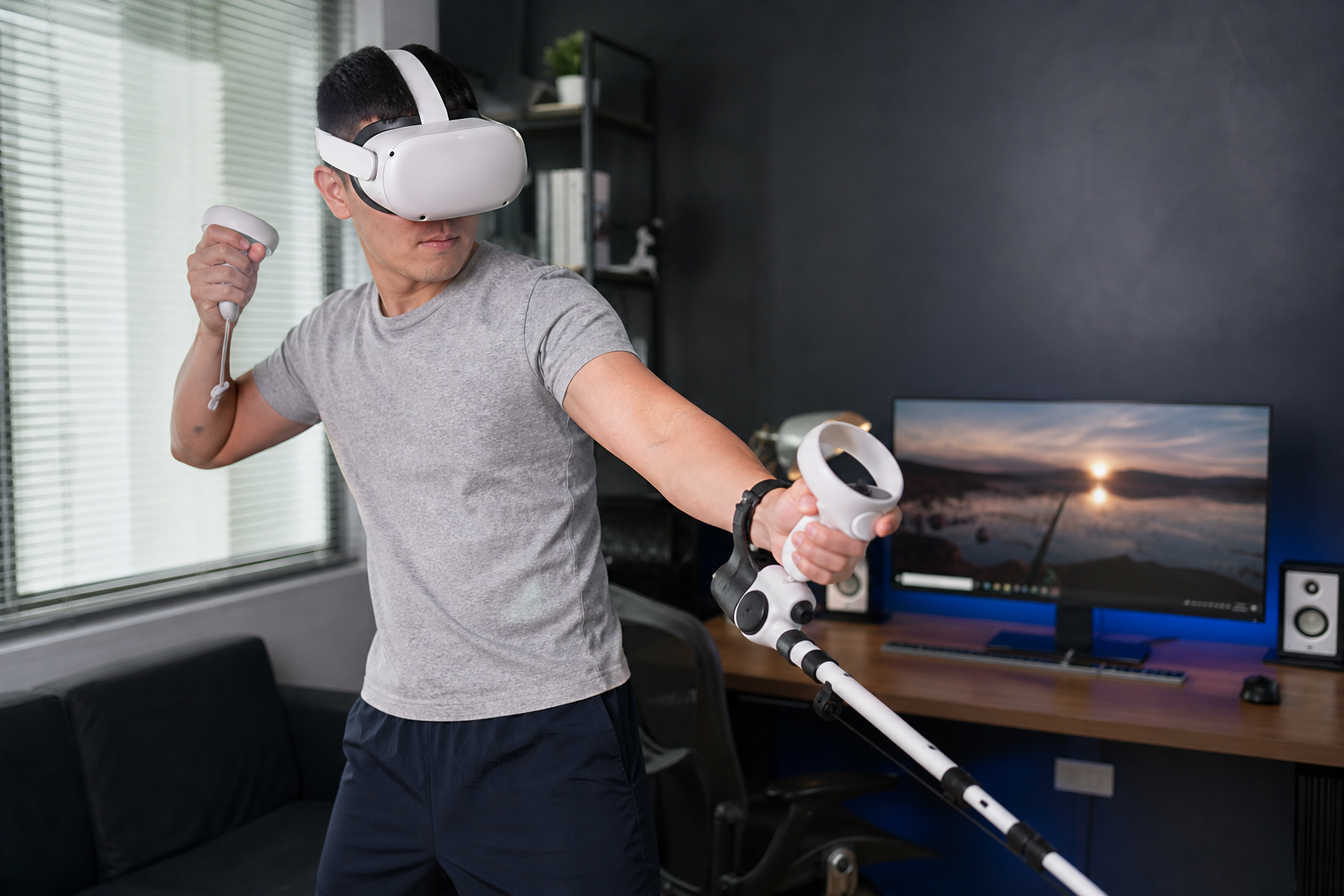 A VR fishing rod accessory with a left Quest Touch Plus controller installed for a left-handed user.
