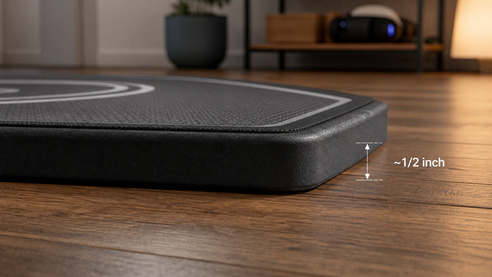 A close-up of a thick VR mat's edge on a hardwood floor, highlighting the potential trip hazard