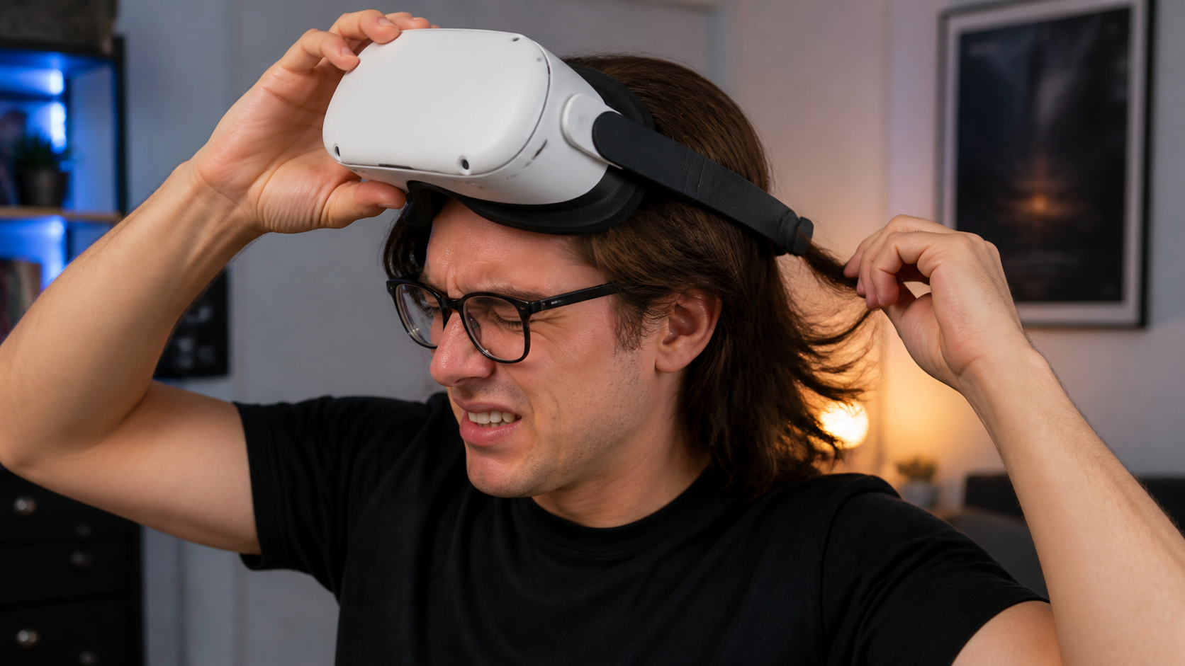 A user with long hair winces slightly as they remove a VR headset with a silicone strap pulling their hair.