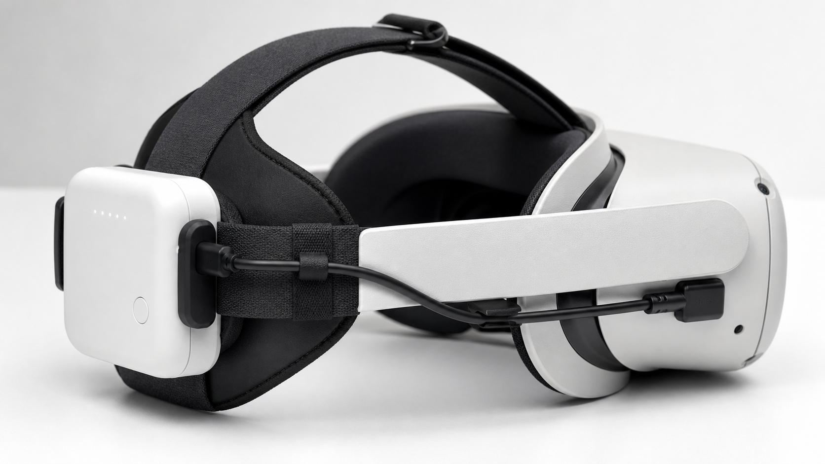 A clean product image showing a VR battery pack with a perfectly routed cable connecting neatly to the headset port.