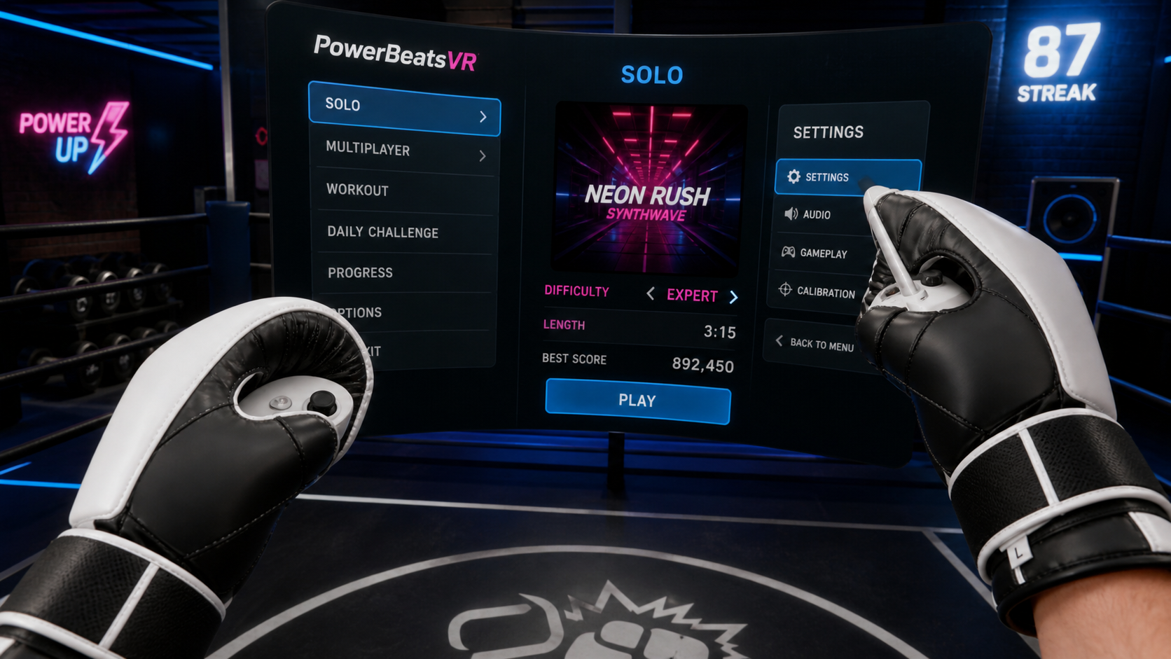 A first-person view of hands in VR boxing gloves easily navigating the PowerBeatsVR menu on the screen