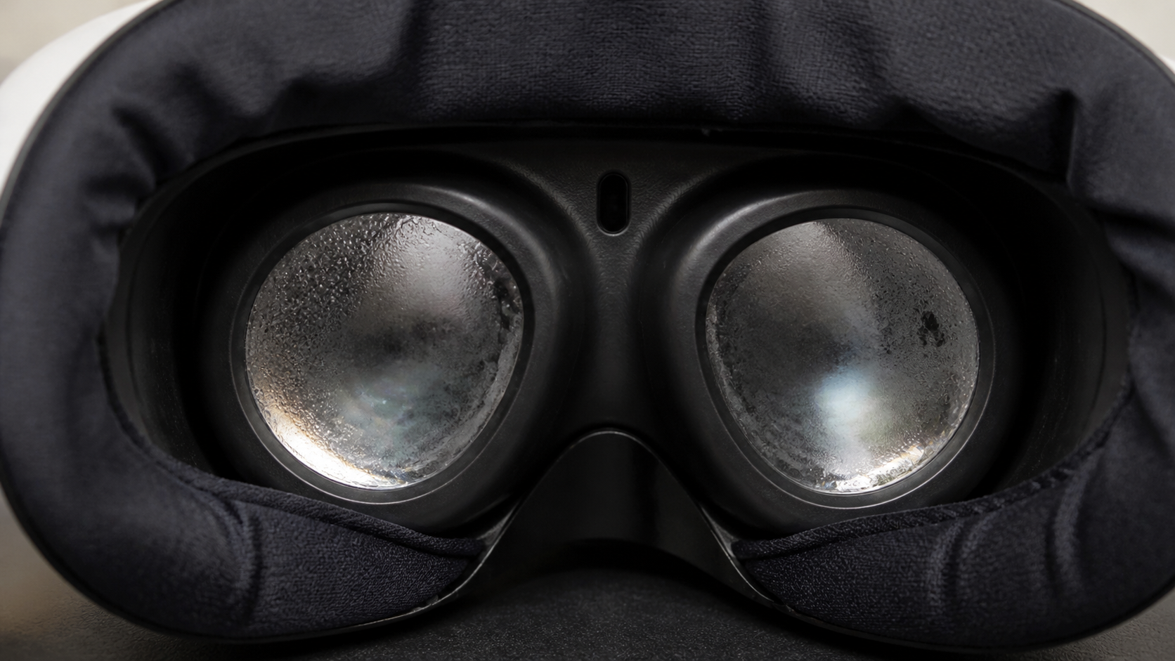 A close-up view of the Meta Quest 3 lenses with a bit of fog on them during a workout.