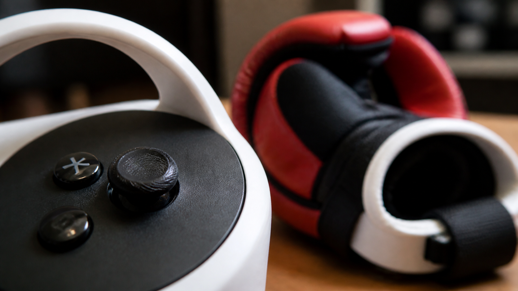 A close-up view of a greasy thumbprint on a VR controller thumbstick, with a boxing glove in the background.