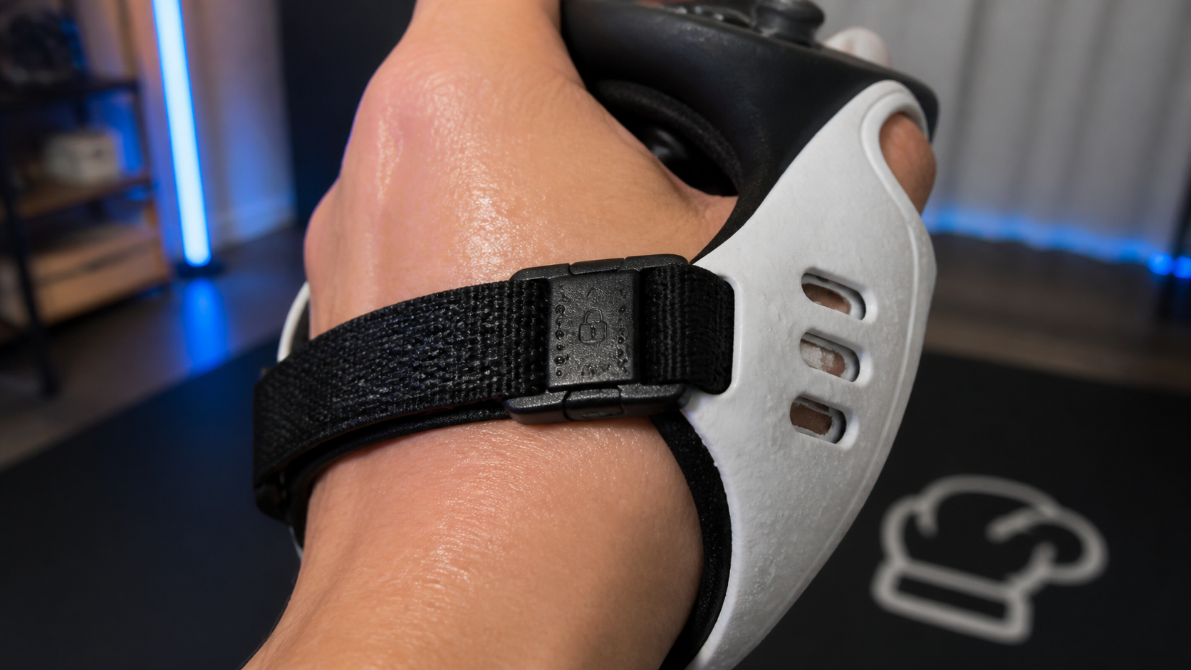 A detailed close-up of the VR glove's secure controller-lock strap after a vigorous boxing workout session.