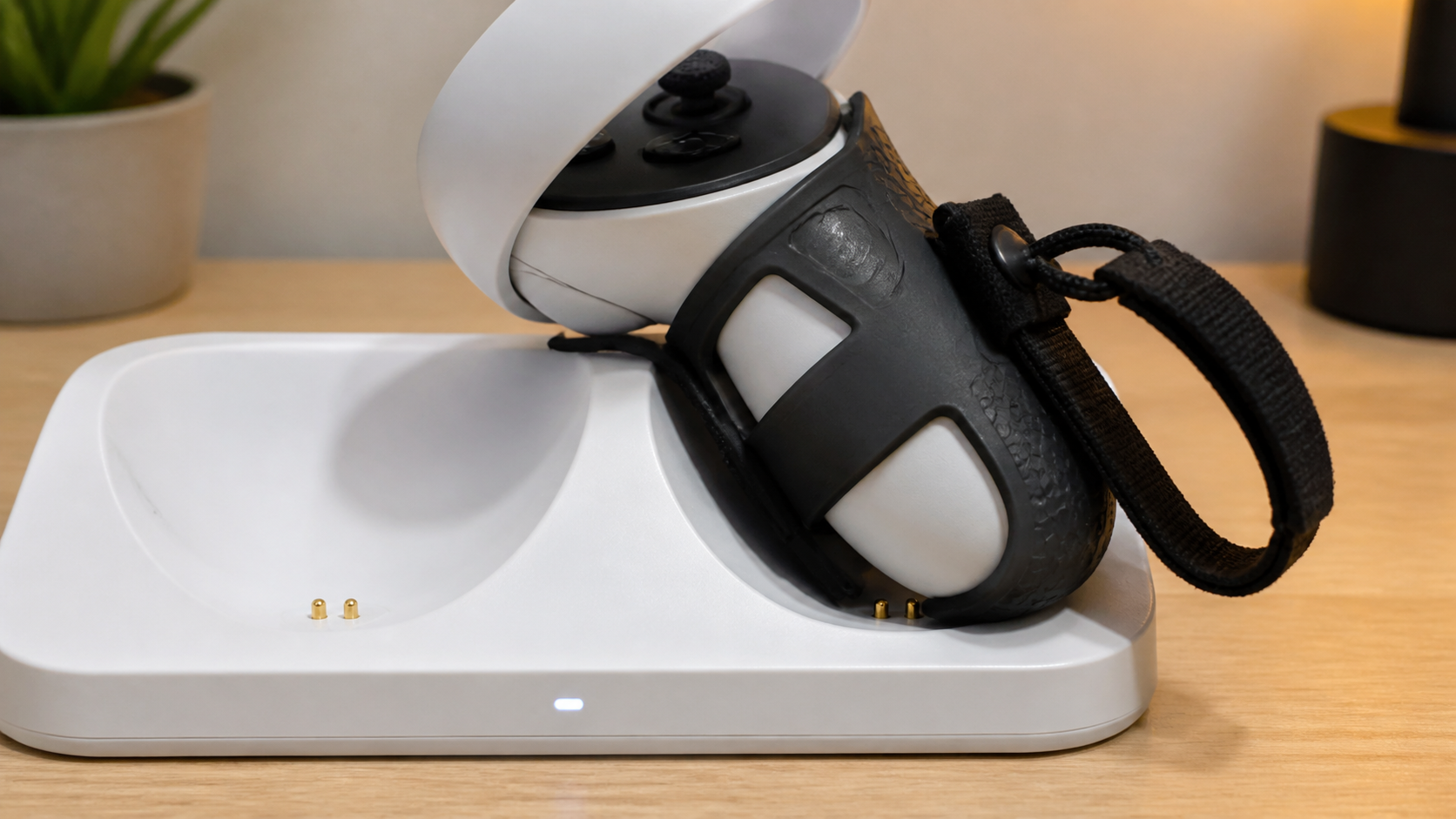 A Quest controller with a third-party grip that does not fit into the official charging dock