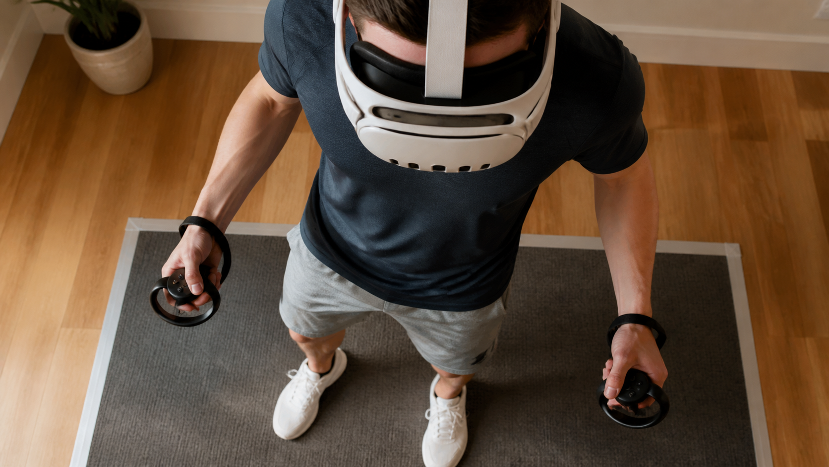 A Quest 3 user with Pro controllers looking down, with the open interface providing a clear view of their feet.