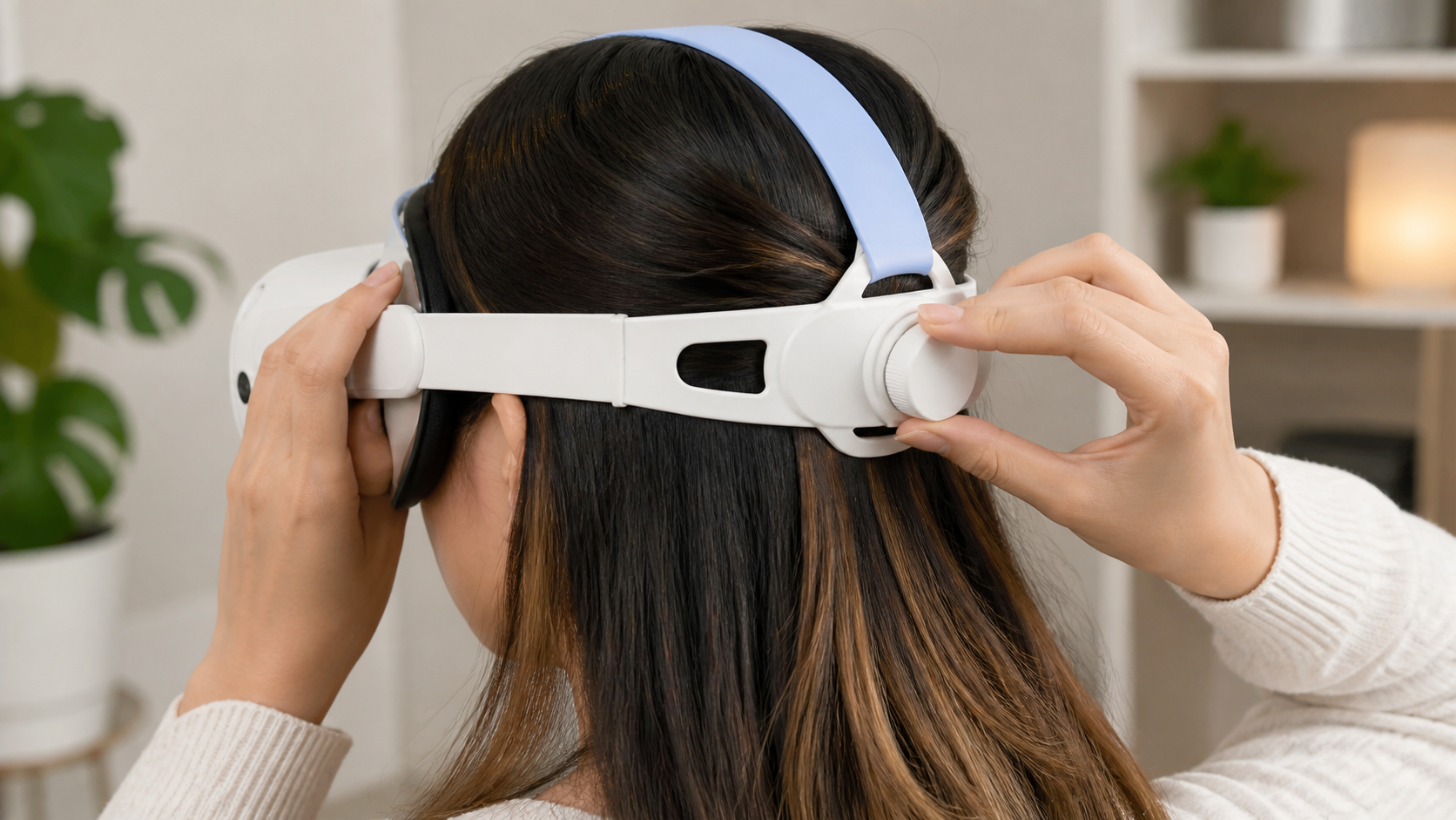 A person with long hair easily adjusting a silicone head strap on their Quest headset without snagging any hair.
