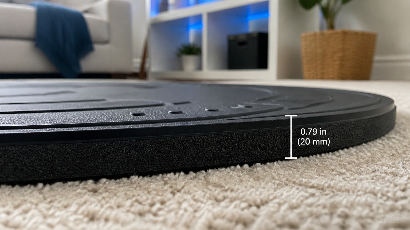 A close-up side-view shot of a VR mat's edge on a carpet, highlighting its thickness and potential trip risk.
