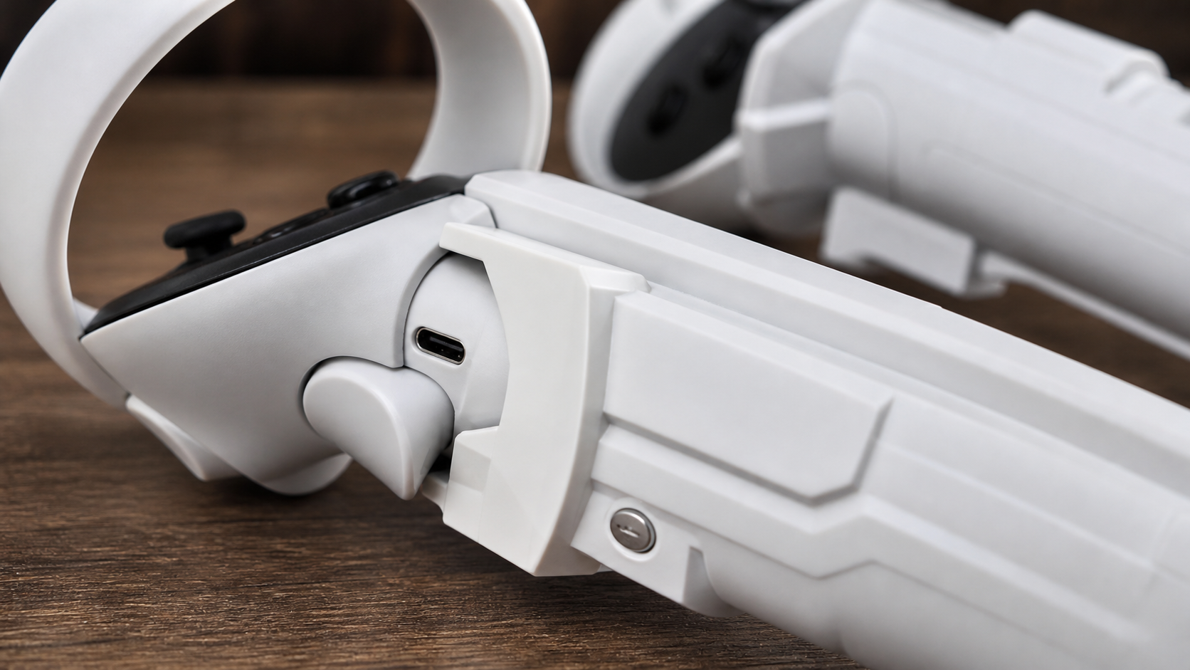A close-up of a VR controller inside a sword attachment with the USB-C charging port completely blocked by plastic.